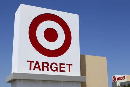 A Target sign is pictured next to one of their stores in Vista, California in this file photo taken April 16, 2014. REUTERS/Mike Blake/Files