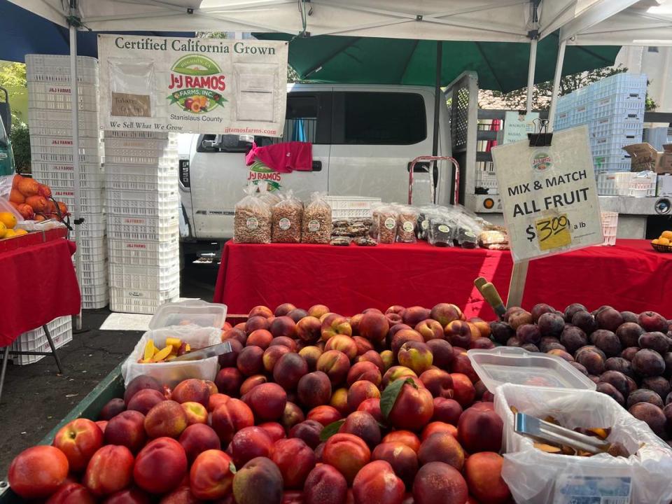 The J&J Ramos Farms stand was offering a a mix and match deal on fruit for $3 a pound at the Modesto Certified Farmers’ Market.