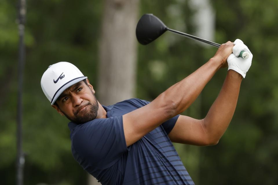 Tony Finau swings his club