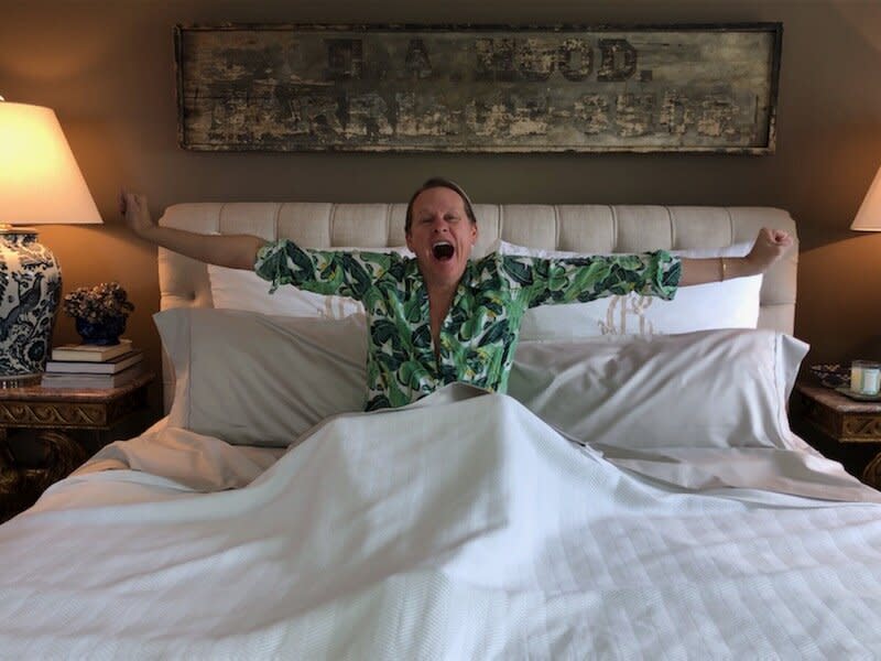 Give Carson Kressley credit: He's committed to the act of promotion. The product in question: <a href="https://sleepletics.com/" target="_blank" rel="noopener noreferrer">bedsheets</a>. And what does Kressley do masterfully in the promo photo? He pretends he's waking up &mdash; which is something many people do in bed. In one movement, he's gone from celeb to everyman.
