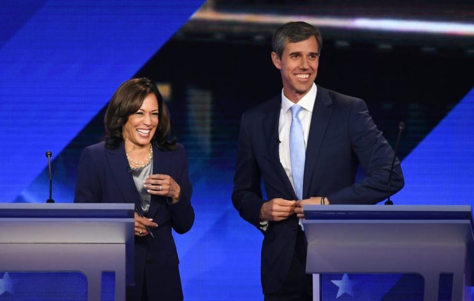 Democratic presidential hopefuls California Senator Kamala Harris and Former Texas Representative Beto O'Rourke share a laugh during a break in the third Democratic primary debate of the 2020 presidential campaign season hosted by ABC News in partnership with Univision at Texas Southern University in Houston, Texas on September 12, 2019. | ROBYN BECK—AFP/Getty Images