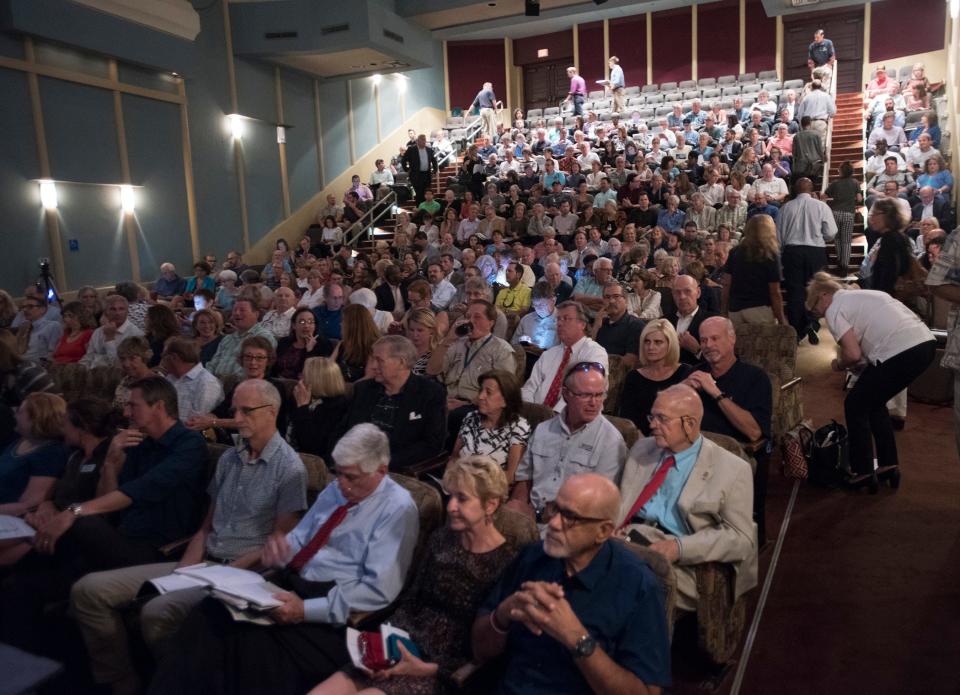 A capacity crowd gathers at the Pensacola Little Theatre Wednesday, Sept. 26 to hear lecturer Chuck Marohn, the author of "Thoughts on Building Strong Towns," speaks during CivicCon.