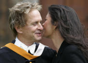 Hollywood star Michael Douglas outside Younger Hall in St Andrews, Scotland, with wife Catherine Zeta Jones after collecting his honorary degree.