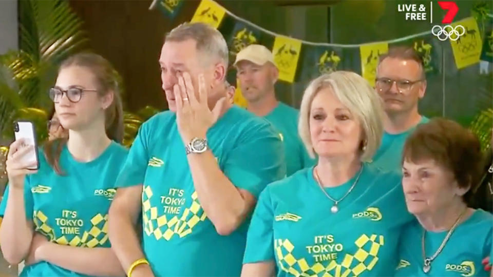 Pictured here, Ariarne Titmus' family watching her win a gold medal in Tokyo from back home in Australia.