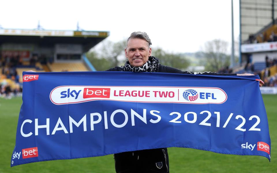  Dale Vince, Owner of Forest Green Rovers celebrates after their sides victory and promotion as League 2 champions during the Sky Bet League Two match between Mansfield Town and Forest Green Rovers at One Call Stadium on May 07, 2022 in Mansfield, England - GETTY IMAGES