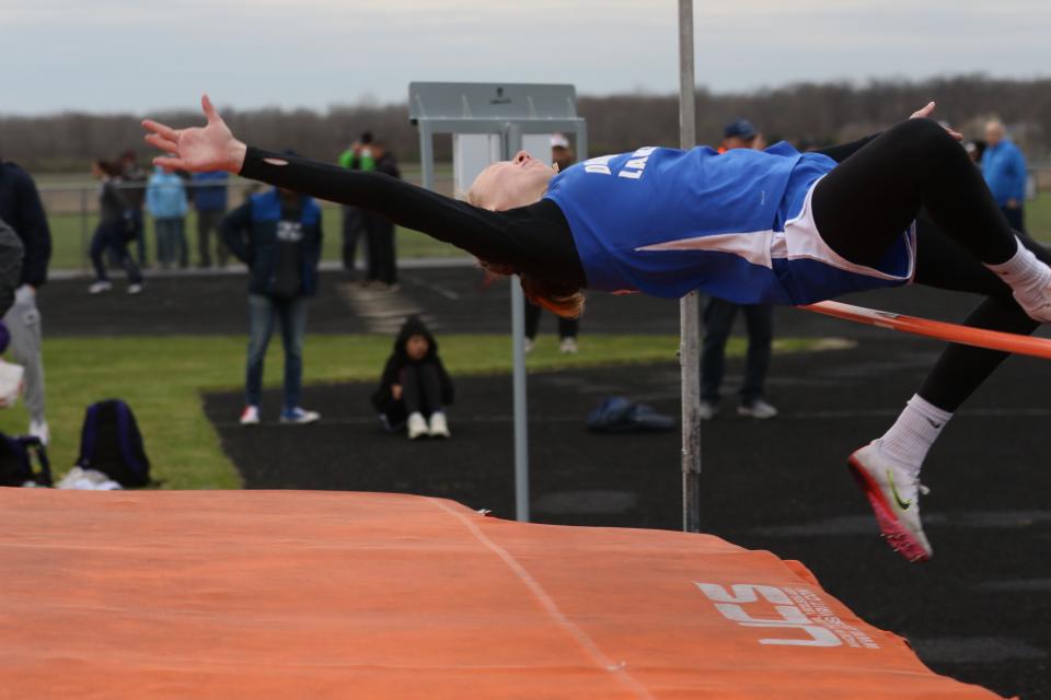 Danbury's Maggie Thompson clears the bar.