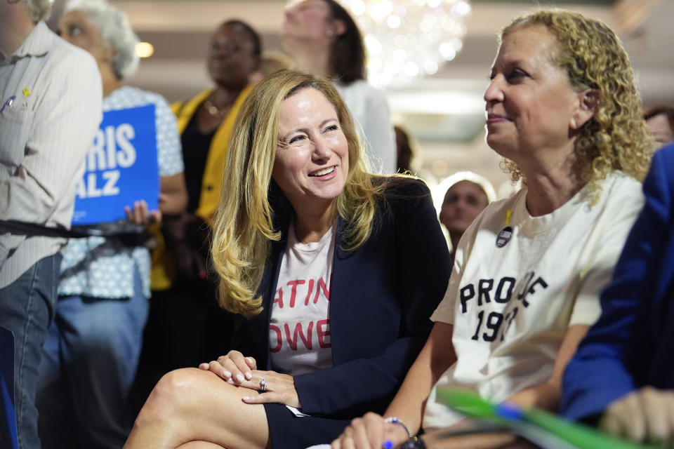 FILE - Former Rep. Debbie Mucarsel-Powell of Florida, center, now a Democratic candidate for the U.S. Senate, center, and Rep. Debbie Wasserman Schultz of Florida, right, help kick off a national "Reproductive Freedom Bus Tour" by the campaign of Democratic presidential nominee Vice President Kamala Harris and running mate Gov. Tim Walz, Tuesday, Sept. 3, 2024, in Boynton Beach, Fla. (AP Photo/Rebecca Blackwell, File)