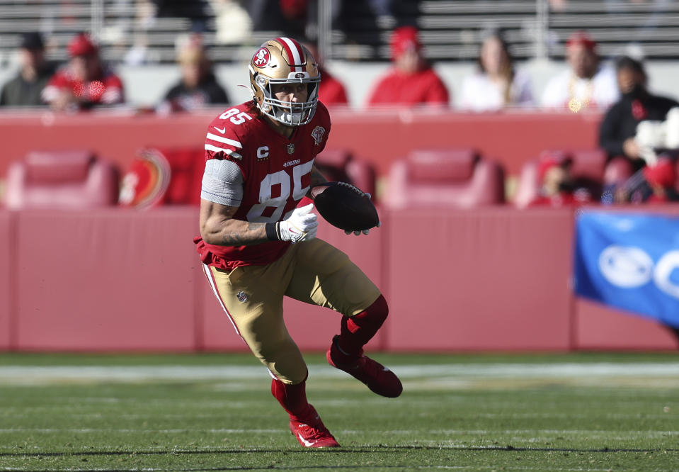 FILE - San Francisco 49ers tight end George Kittle runs against the Houston Texans during the first half of an NFL football game Jan. 2, 2022, in Santa Clara, Calif. Tight End U is back for a second straight year in Nashville, Tenn., the offseason home of Kittle. Kittle, a three-time Pro Bowler, started this a year ago with seven-time Pro Bowl tight end Travis Kelce and another three-time Pro Bowl tight end in Greg Olsen, who's now retired. (AP Photo/Jed Jacobsohn, File)