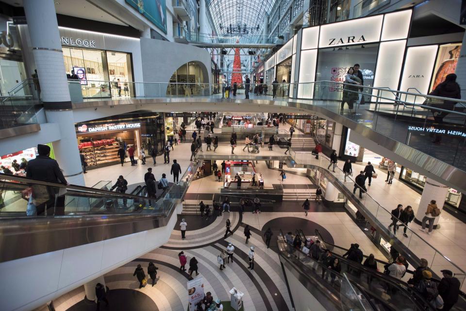 People walk at the Eaton Centre in Toronto on Wednesday, Dec. 26, 2018. Statistics Canada says retail sales fell 0.1 per cent in September to $51.6 billion, weighed down by lower sales at motor vehicle and parts dealers and gasoline stations. THE CANADIAN PRESS/Tijana Martin