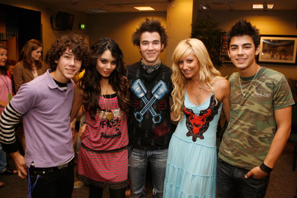<p>OMG it's the Jonas Brothers, and they're not even fully formed. Nick, Kevin, Joe, and their respective hairdon'ts joined Vanessa and Ashley at a Radio Disney concert. Fun was had, I'm sure.</p>