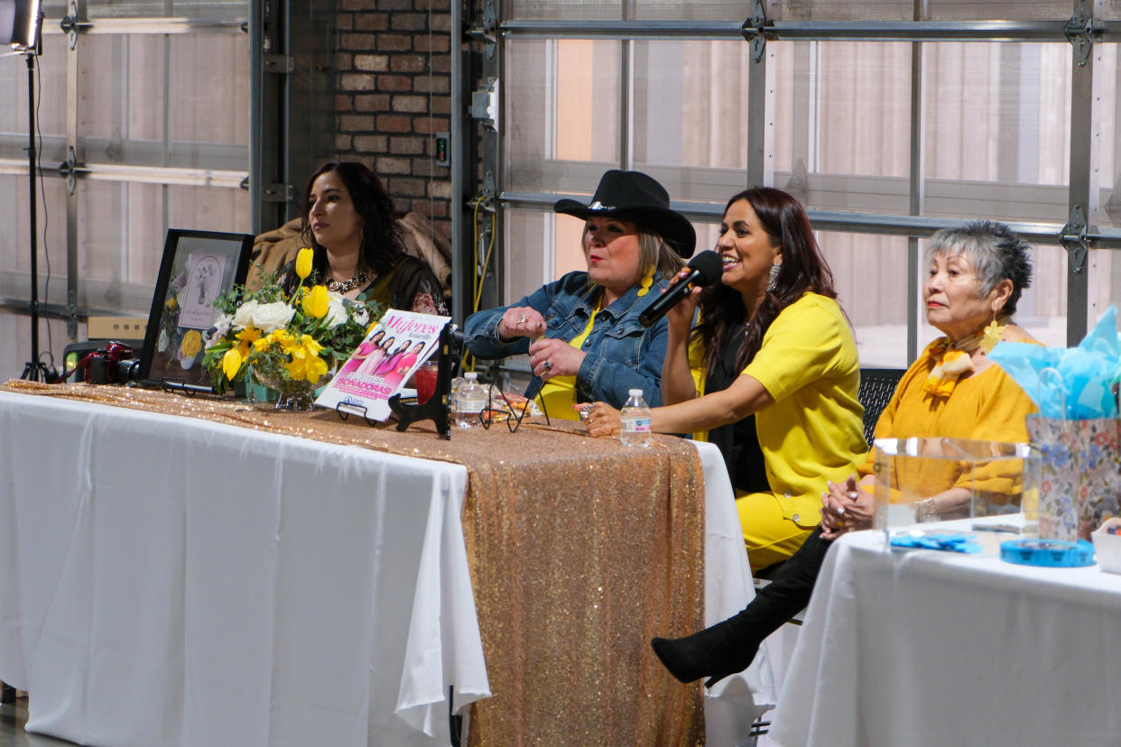 Yolanda Mendoza speaks as part of a panel to the audience at AM de Amarillo's Mujeres de Amarillo (women in yellow) event last weekend in east Amarillo.