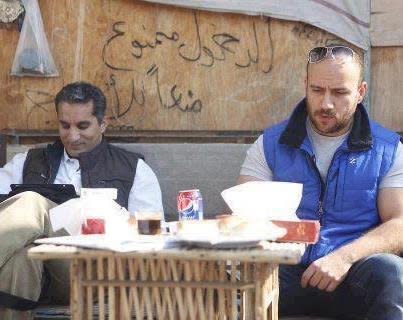 Egyptian comedians Bassem Youssef and Ahmed Mekki take part in a sit in outside the Egyptian presidential palace, where they protested against President Mohamed Mursi’s policies.