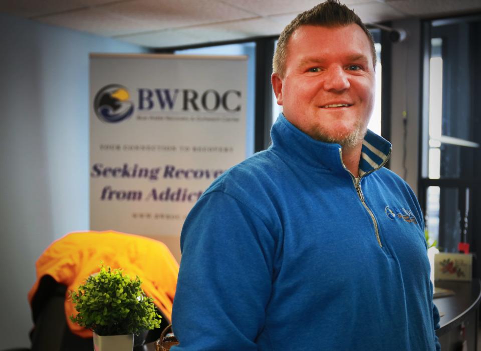 Patrick Patterson, Blue Water Recovery and Outreach Center executive director, stands by the entrance of BWROC on Wednesday, Feb. 9, 2022.