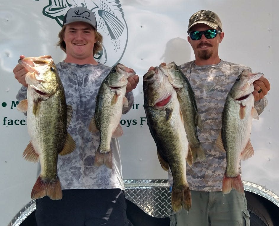 Weston Smith, left, and Garrett Foster had 17.65 pounds and a 5.85 pound big bass to win to win the Country Boys Fishing LLC Sunday Open tournament June 5 at Lake Rochelle. PROVIDED BY MONICA STONE