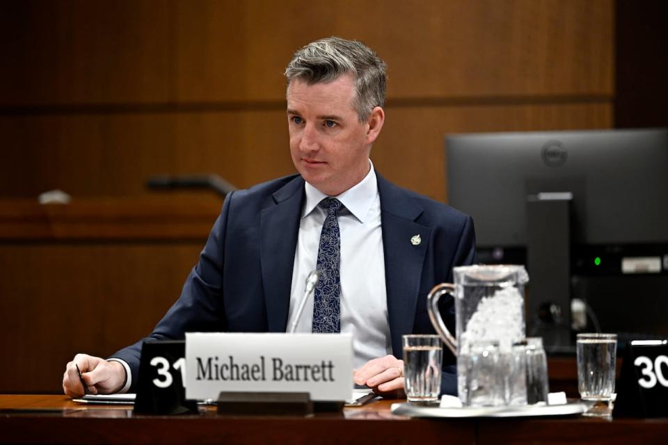 Leeds-Grenville-Thousand Islands and Rideau Lakes Conservative MP Michael Barrett awaits the start of a committee meeting Jan. 17, 2024.