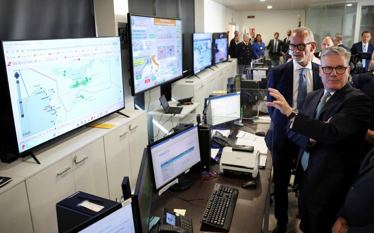 Sir Keir Starmer is pictured today during a visit to Italy's national immigration crime coordination centre in Rome