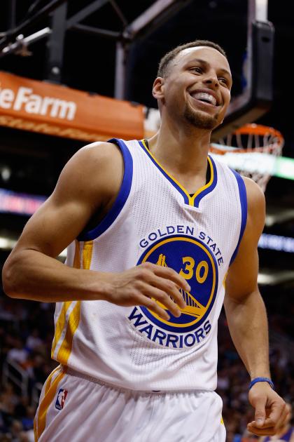 Stephen Curry can smile knowing he's got his second NBA MVP award all but wrapped up. (Christian Petersen/Getty Images)