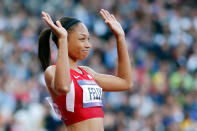 Allyson Felix of the United States waves after competing in the Women's 100m Semi Final on Day 8 of the London 2012 Olympic Games at Olympic Stadium on August 4, 2012 in London, England. (Photo by Jamie Squire/Getty Images)