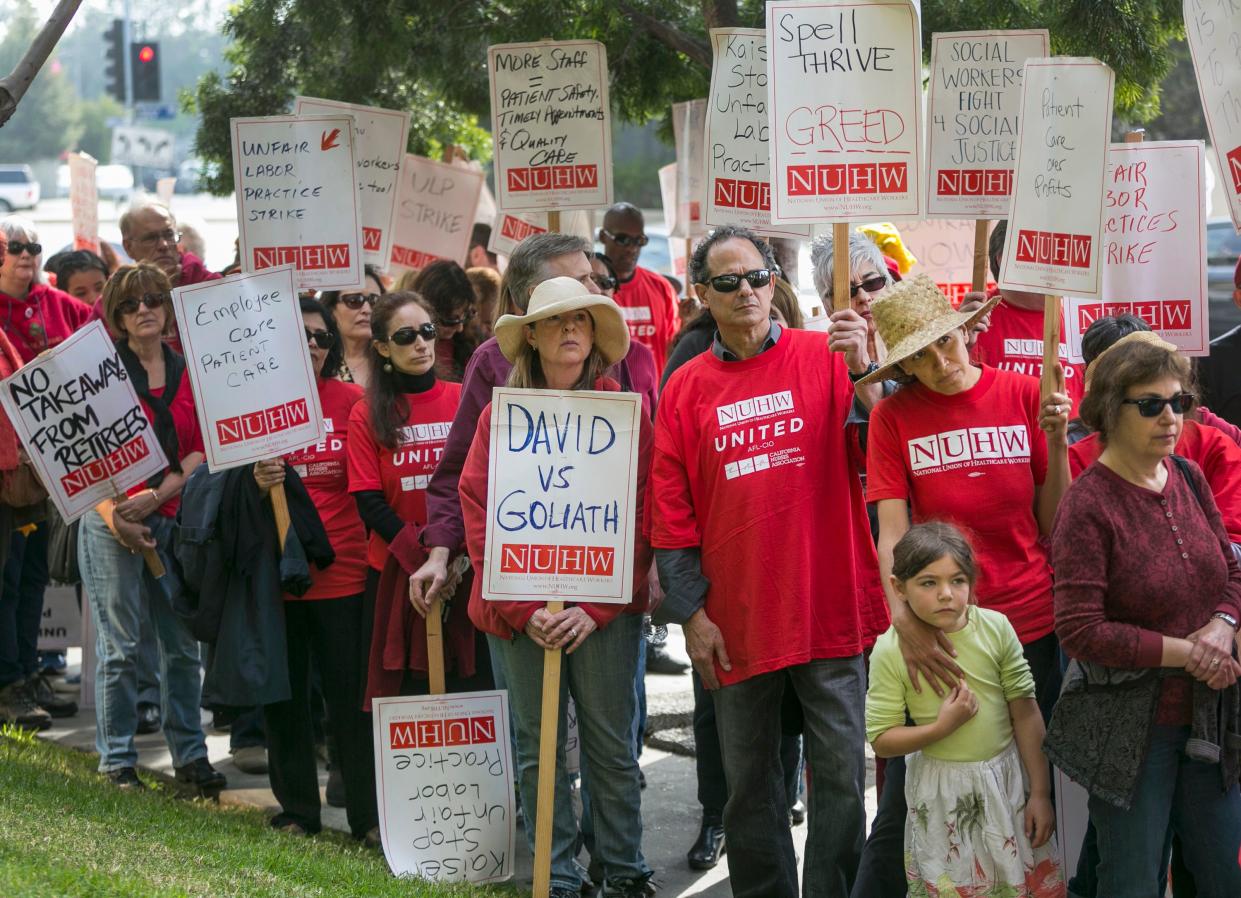 Kaiser Permanente mental health professionals and family members rally outside the Kaiser Permanente West Los Angeles Medical Center on Jan. 12, 2015.