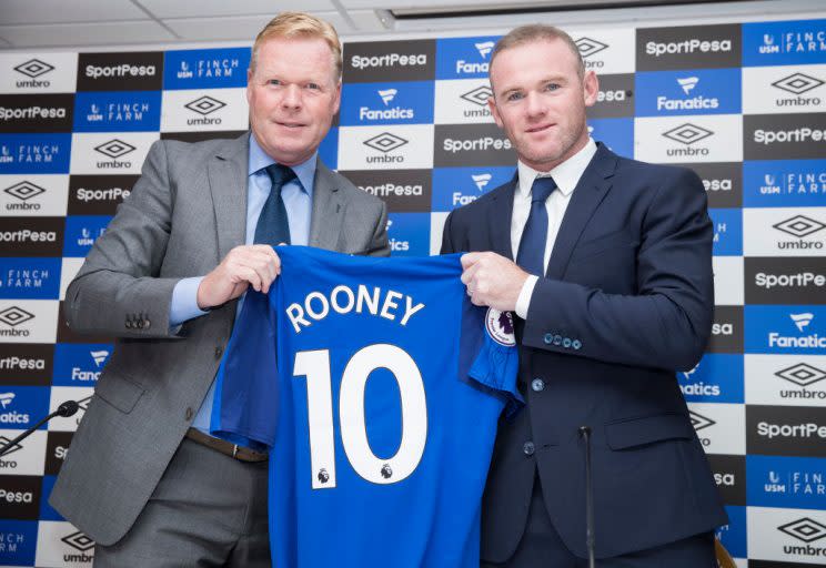 LIVERPOOL, ENGLAND – JULY 10: New Everton Signing Wayne Rooney is given his shirt by Manager Ronald Koeman at Goodison Park on July 10, 2017 in Liverpool, England. (Photo by Mark Robinson/Getty Images)