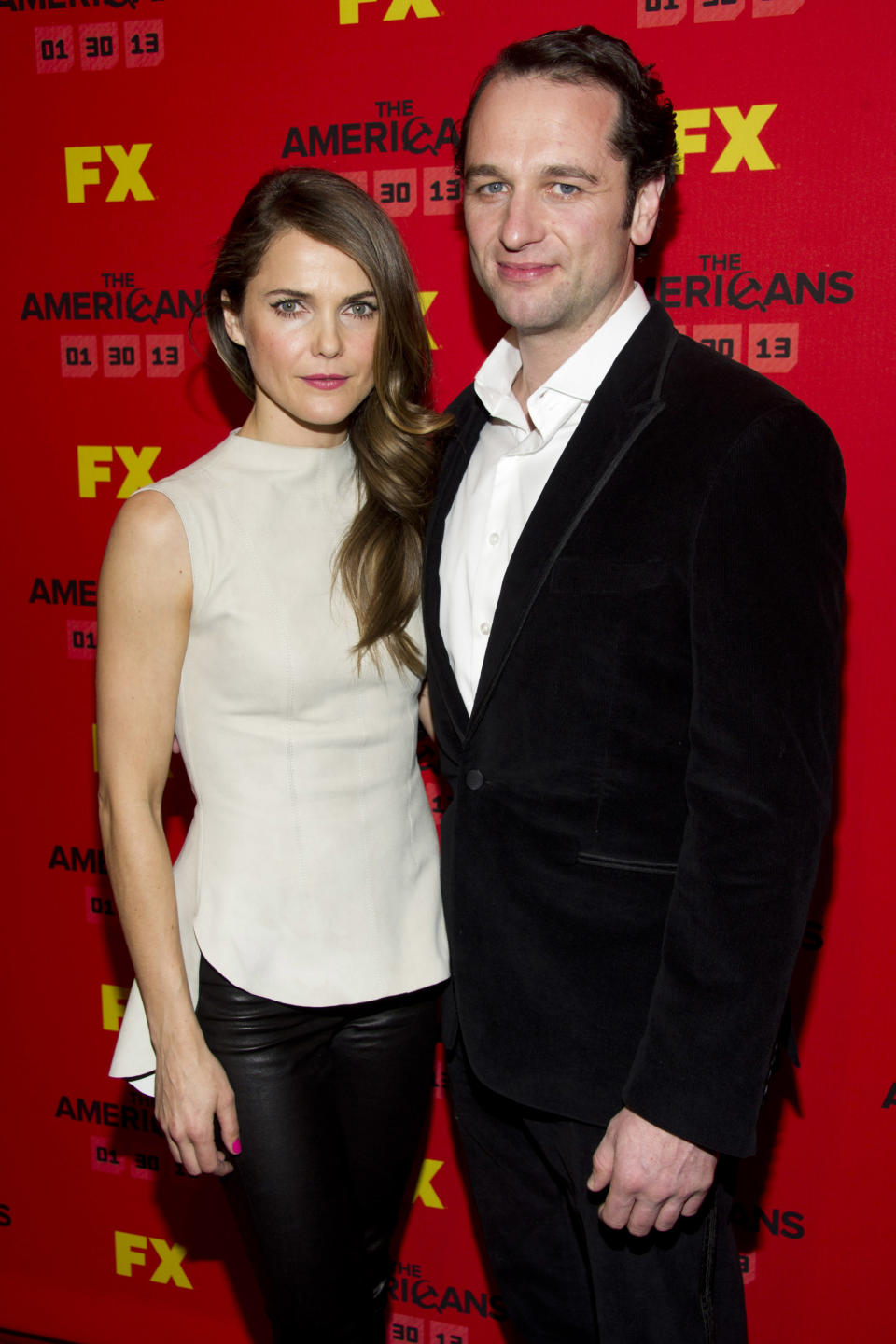 FILE - This Jan. 26, 2013 photo shows Keri Russell left, and Matthew Rhys at the premiere of the FX television series "The Americans" in New York. The new FX drama, airing Wednesday at 10 p.m. EST on FX, focuses on two KGB spies posing as an ordinary American couple shortly after Ronald Reagan was elected president. (Photo by Charles Sykes/Invision/AP, file)