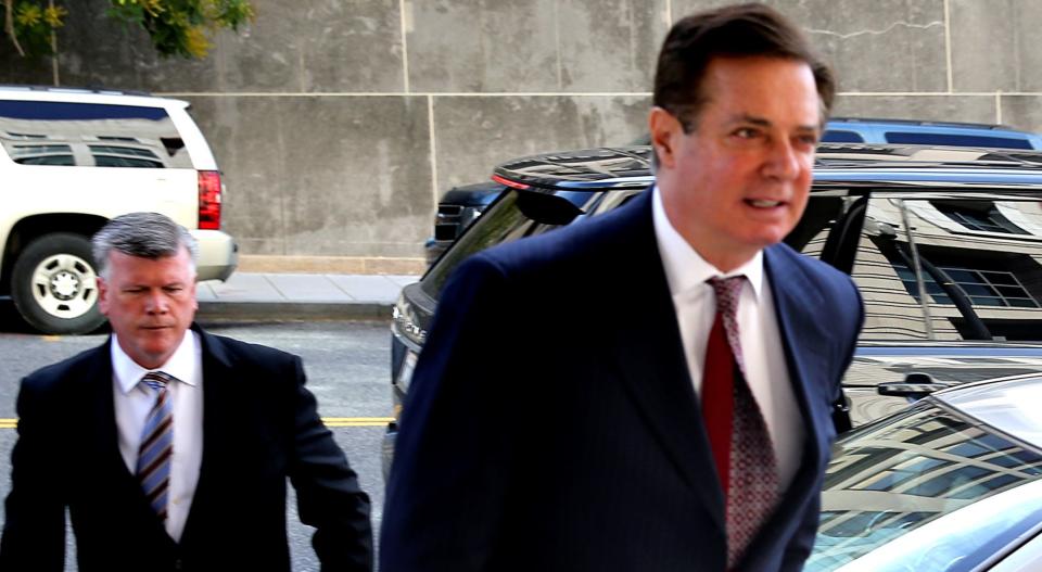 Former Trump campaign chairman Paul Manafort (right) secretly met with WikiLeaks founder Julian Assange on multiple occasions, according to The Guardian. (Photo: Jonathan Ernst/Reuters)