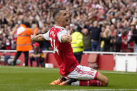 Arsenal's Granit Xhaka celebrates after scoring his side's third goal during the English Premier League soccer match between Arsenal and Tottenham Hotspur, at Emirates Stadium, in London, England, Saturday, Oct. 1, 2022. (AP Photo/Kirsty Wigglesworth)