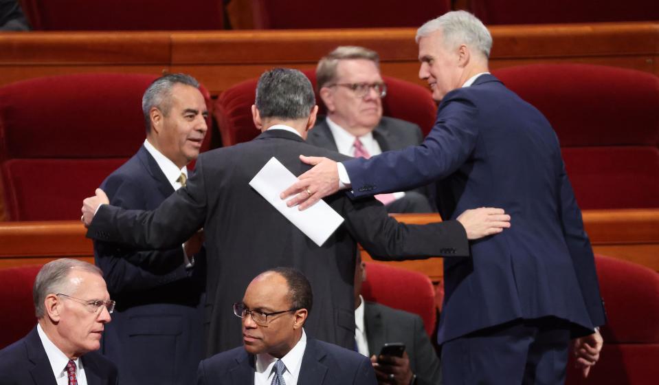 General leaders of the church greet each other prior to the Sunday morning session of the 193rd Semiannual General Conference of The Church of Jesus Christ of Latter-day Saints at the Conference Center in Salt Lake City on Sunday, Oct. 1, 2023. | Jeffrey D. Allred, Deseret News