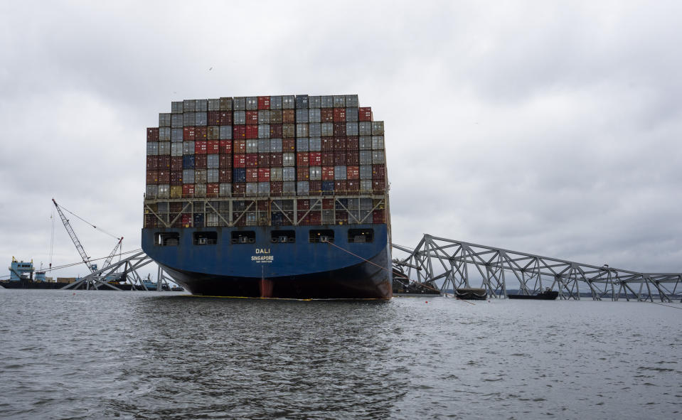 The Dali, a massive container ship from Singapore, still sits amid the wreckage and collapse of the Francis Scott Key Bridge in the Baltimore port, Monday, April 1, 2024. (Kaitlin Newman/The Baltimore Banner via AP)