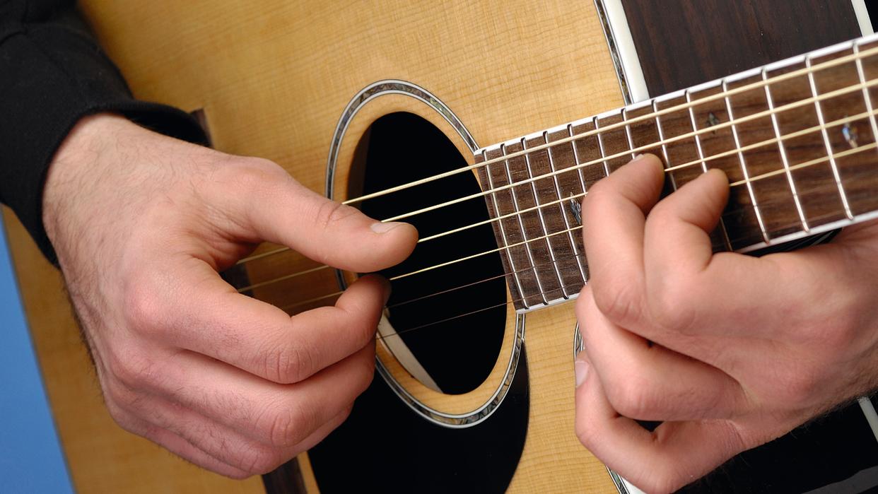  Acoustic Guitar being played  