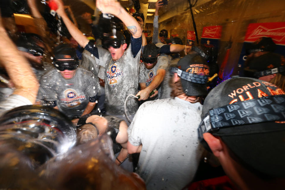 <p>Members of the Houston Astros celebrate in the clubhouse after defeating the Los Angeles Dodgers in Game 7 of the 2017 World Series at Dodger Stadium on Wednesday, November 1, 2017 in Los Angeles, California. (Photo by Alex Trautwig/MLB Photos via Getty Images) </p>