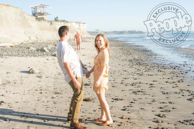 Man Wearing G-String Hilariously Photobombs Couple's Sunset Engagement  Shoot at the Beach