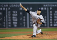 New York Yankees starting pitcher Masahiro Tanaka delivers to the Boston Red Sox during the first inning of a baseball game at Fenway Park in Boston, Tuesday, April 22, 2014. (AP Photo/Elise Amendola)