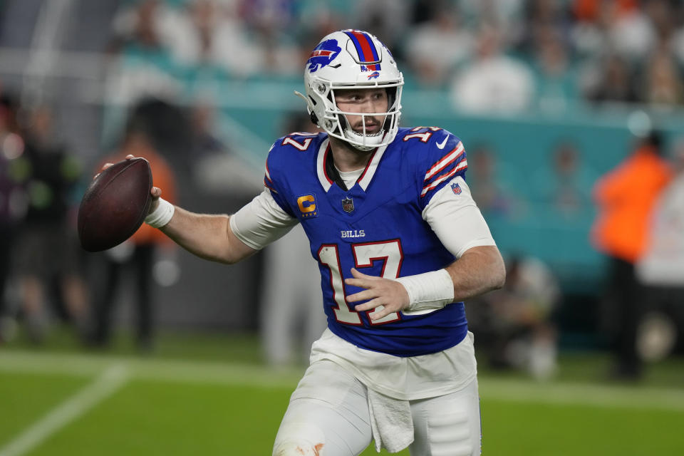 Buffalo Bills quarterback Josh Allen (17) aims a pass during the first half of an NFL football game against the Miami Dolphins, Sunday, Jan. 7, 2024, in Miami Gardens, Fla. (AP Photo/Lynne Sladky)