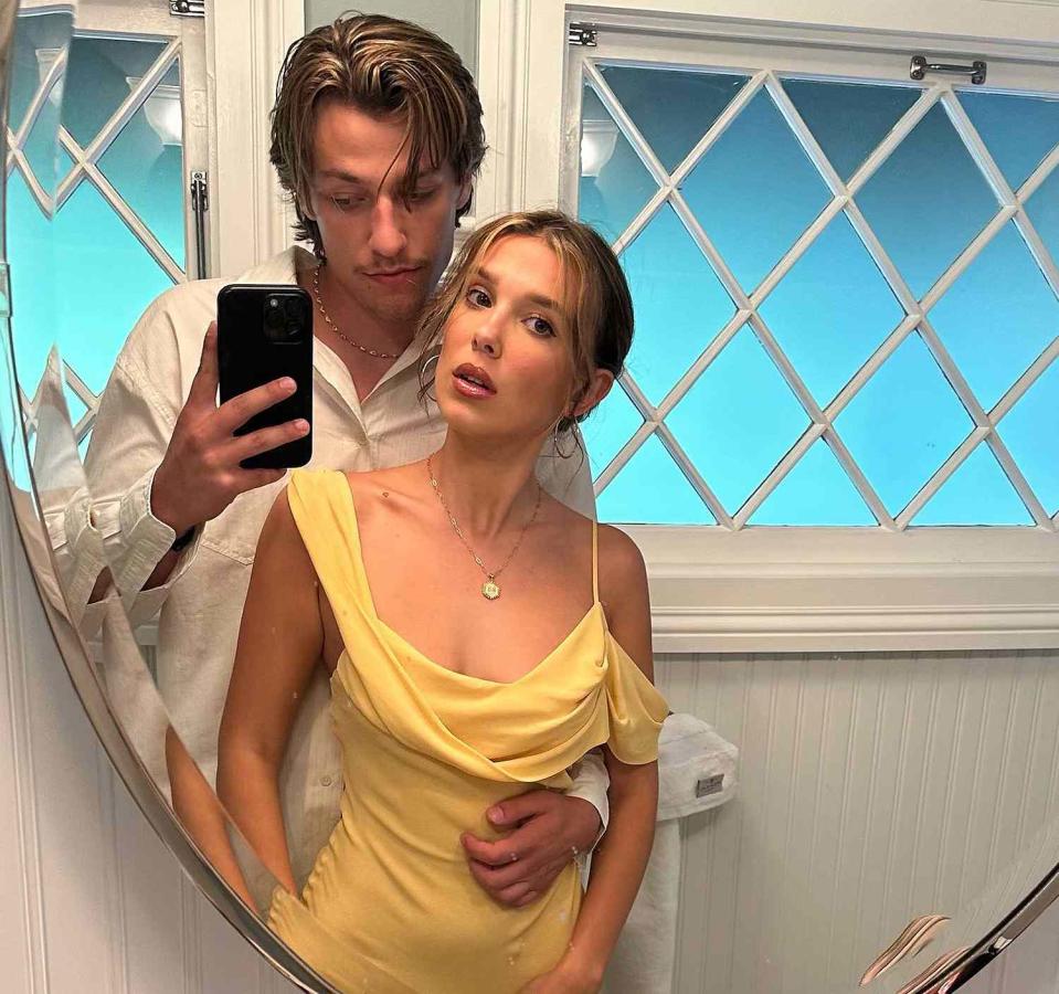 <p>Millie Bobby Brown/Instagram</p> Millie Bobby Brown poses with fiancé Jake Bongiovi in a mirror selfie on Instagram.