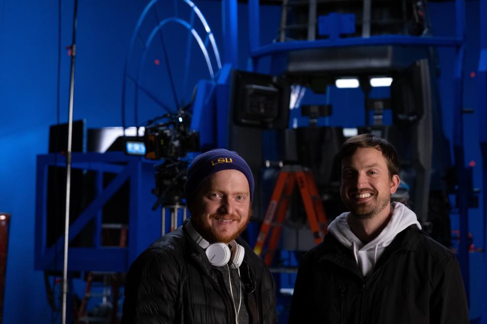 Directors Bryan Woods and Scott Beck on the set of 65.