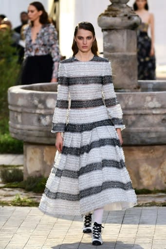 Sober glamour: A crystal-encrusted striped dress at Chanel's haute couture Paris show