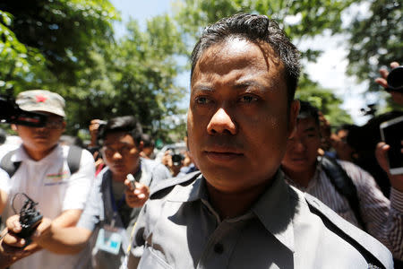 Myanmar police officer Naing Lin arrives at a court hearing in the case of Reuters journalists in Yangon, Myanmar May 16, 2018. REUTERS/Ann Wang