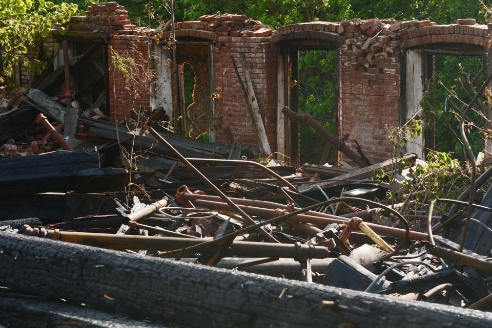 The aftermath of a May 22 fire at the former Capehart Mill in the Greeneville section of Norwich.