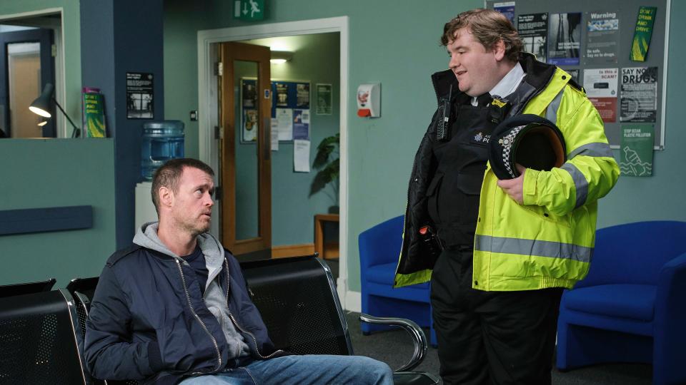 Arthur (Jonas Armstrong) with officer Ben (Ethan Lawrence) in the police station in Boat Story episode 1