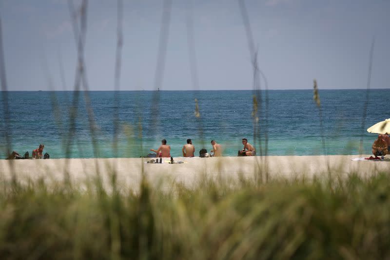 FILE PHOTO: Beaches reopen with restrictions to limit the spread of the coronavirus disease in Miami Beach