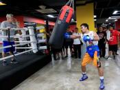 Senator and boxing champion Manny "Pacman" Pacquiao trains inside the Elorde gym in Pasay city, metro Manila, Philippines September 28, 2016 in preparation for his upcoming bout with Jessie Vargas next month in Las Vegas, U.S.A.REUTERS/Romeo Ranoco