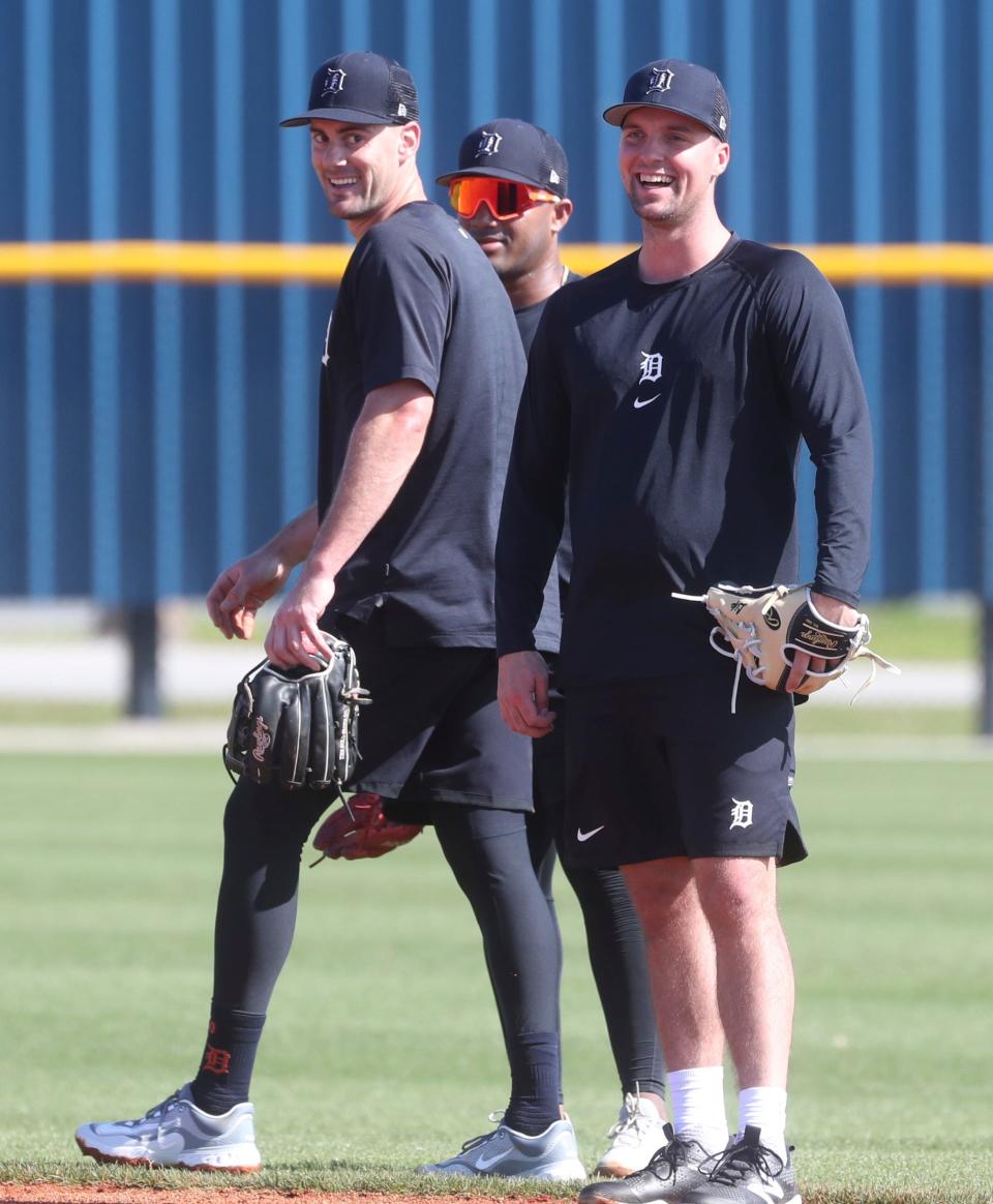 Tigers infielders Ryan Kreidler, Andy Ibanez and Andre Lipcius field ground balls during spring training on Friday, Feb. 17, 2023, in Lakeland, Florida.