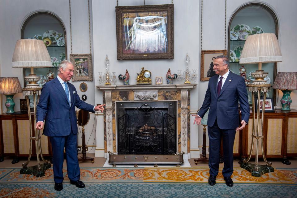 Britain's Prince Charles, Prince of Wales (R) meets with Iraqi Prime Minister Mustafa al-Kadhemi at Clarence House, central London on October 22, 2020. (Photo by Victoria Jones / POOL / AFP) (Photo by VICTORIA JONES/POOL/AFP via Getty Images)