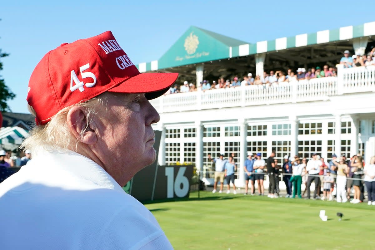 Donald Trump’s golf clubs in New Jersey may be at risk of losing their liquor licenses  (AFP via Getty Images)