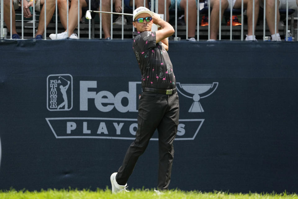 Rickey Fowler watches his tee shot on the 16th hole during the second round of the BMW Championship golf tournament, Friday, Aug. 18, 2023, in Olympia Fields, Ill. (AP Photo/Charles Rex Arbogast)