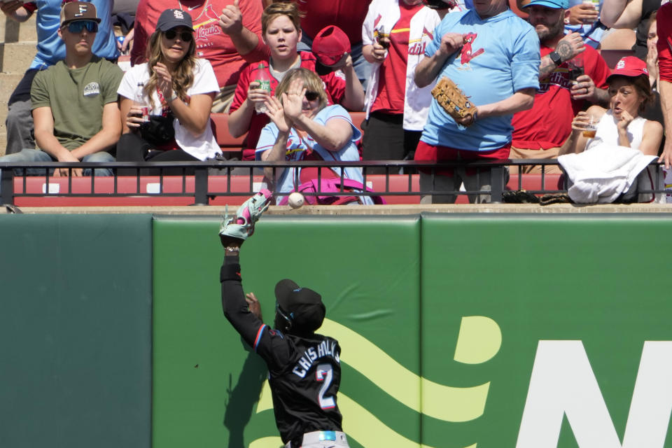 Miami Marlins center fielder Jazz Chisholm Jr. is unable to catch a solo home run by St. Louis Cardinals' Nolan Gorman during the fifth inning of a baseball game Sunday, April 7, 2024, in St. Louis. (AP Photo/Jeff Roberson)