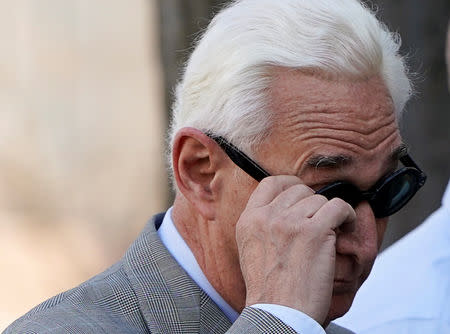 FILE PHOTO: Roger Stone, longtime political ally of U.S. President Donald Trump, waves as he arrives for a status hearing in the criminal case against him brought by Special Counsel Robert Mueller at U.S. District Court in Washington, U.S., March 14, 2019. REUTERS/Joshua Roberts/Files
