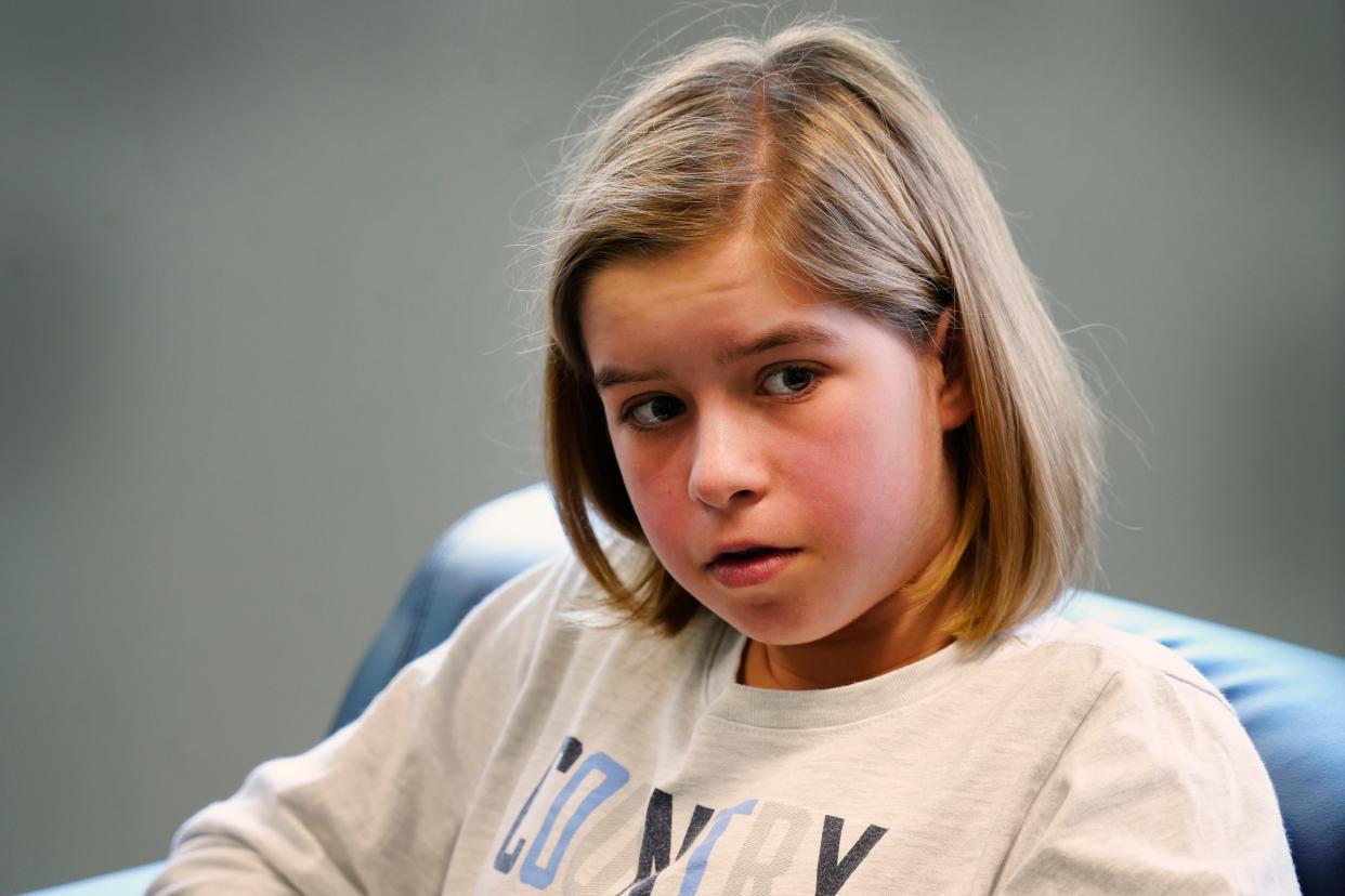 "It forces you to connect more with the present," Olivia Ims, an eighth-grader, said of the cellphone ban at Cincinnati Country Day School.