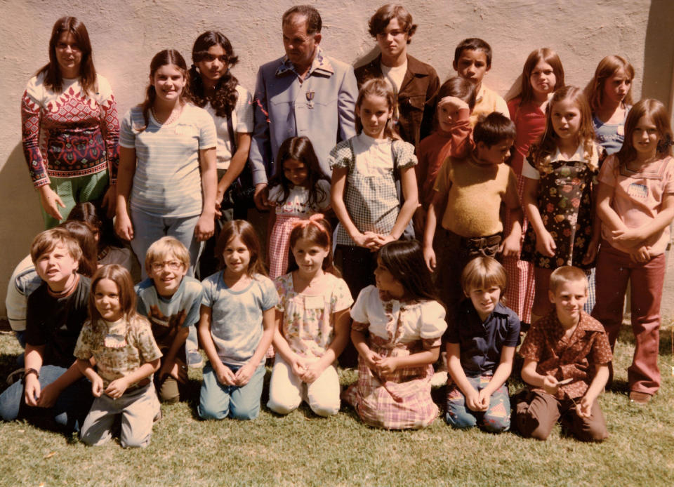 Many of the survivors of the Chowchilla kidnapping gathered for a photo at the Ed Ray Day celebration on August 22, 1976. Ray, the school bus driver, is pictured back row center next to Michael Marshall.  / Credit: Jennifer Brown Hyde